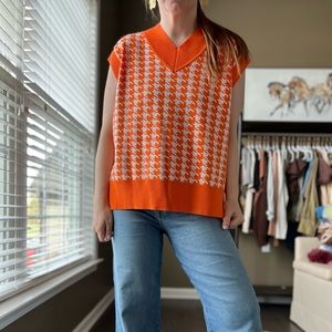 Orange drop sleeve houndstooth sweater vest. Size large